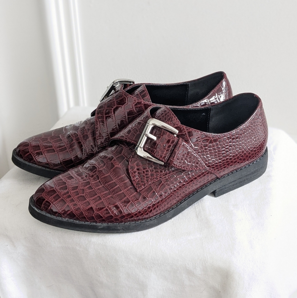 Patent leather loafers by Aldo